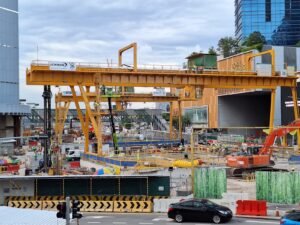 Large crane in the industrial sector used at daytime