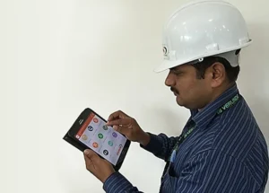 Jenmon employee using eSOS platform on his tablet