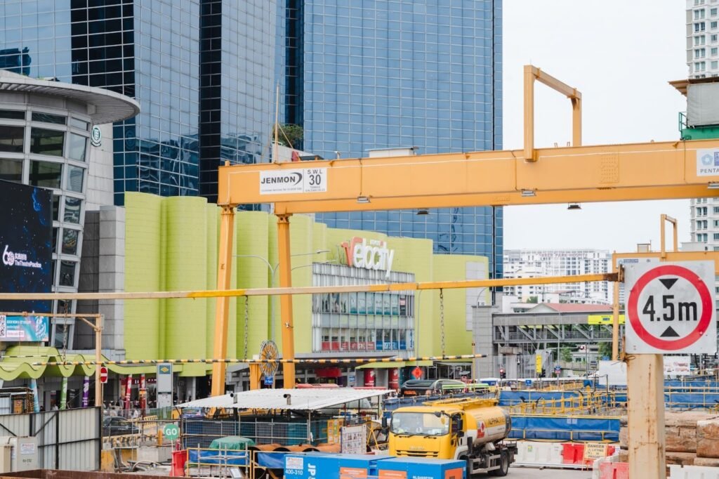 A huge crane is used in an outdoor work facility