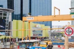 A huge crane is used in an outdoor work facility