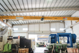 Overhead crane inside a facility with minimal space