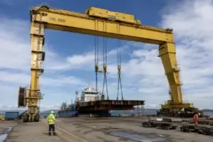 A big gantry outdoors for lifting heavy items at a coastal site